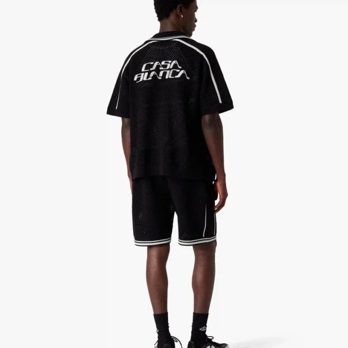 Camisa de malla negra de manga corta