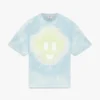 Camiseta de manga corta oversize con estampado tie-dye azul y el logotipo «CC Smile»
