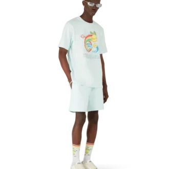 Camiseta de pantalón corto con pelota de tenis de manga