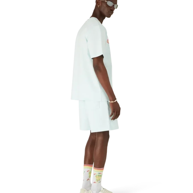 Camiseta de pantalón corto con pelota de tenis de manga