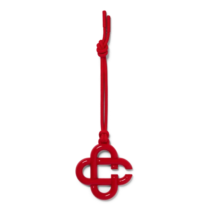 Dije con el logotipo CC