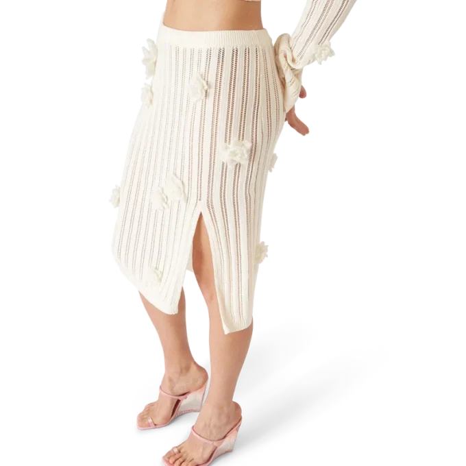 Falda de punto con encaje floral