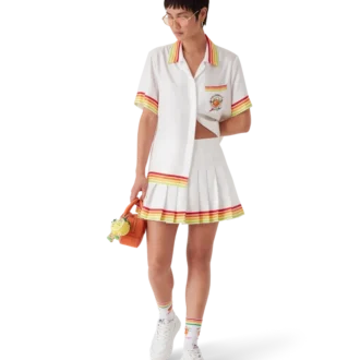 Falda plisada de sarga de seda con mascota naranja