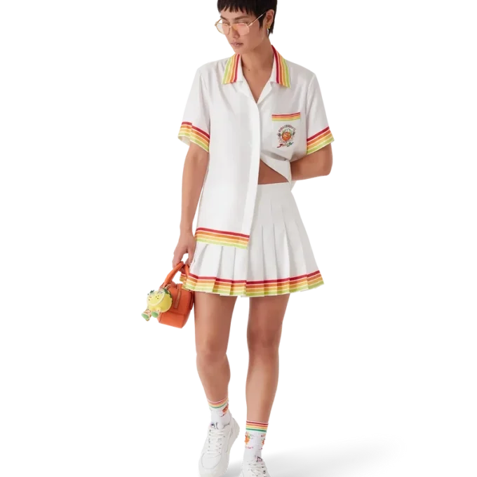 Falda plisada de sarga de seda con mascota naranja Falda plisada de sarga de seda con mascota naranja