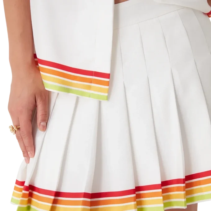 Falda plisada de sarga de seda con mascota naranja Falda plisada de sarga de seda con mascota naranja