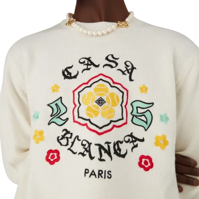 Jersey de cuello redondo de punto merino con emblema