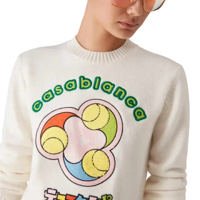 Jersey de cuello redondo de punto merino con estampado de pelotas de tenis