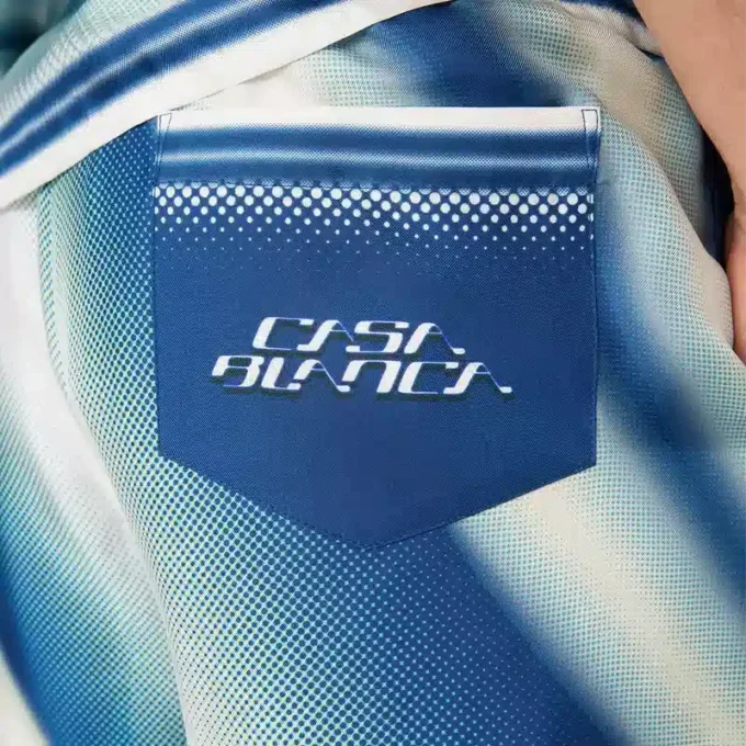 Pantalones cortos de seda «The Art of the Serve»