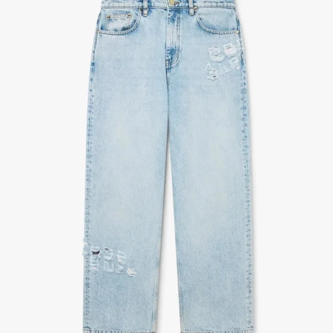 Pantalones de mezclilla con grafitis de lavado claro