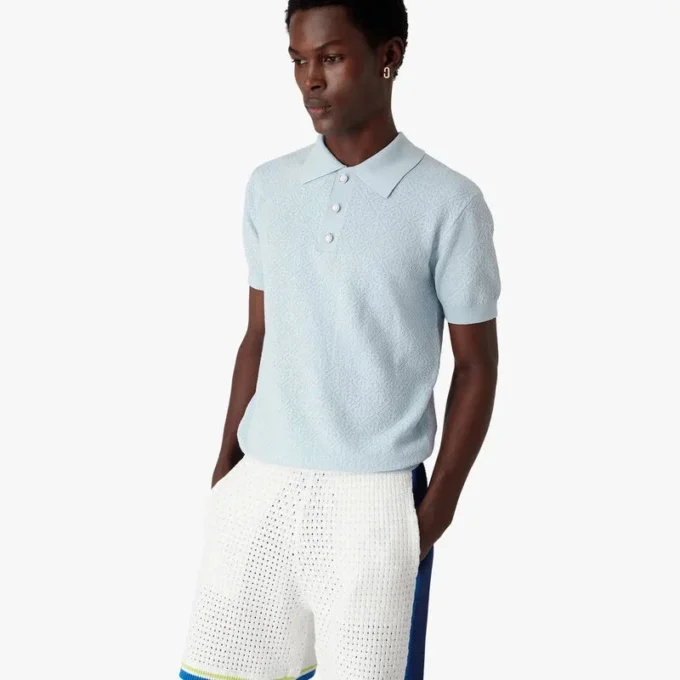 Polo de pantalón corto con monograma azul en punto calado