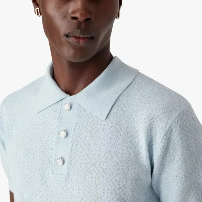 Polo de pantalón corto con monograma azul en punto calado