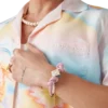Pulsera de perlas con nudos rosa