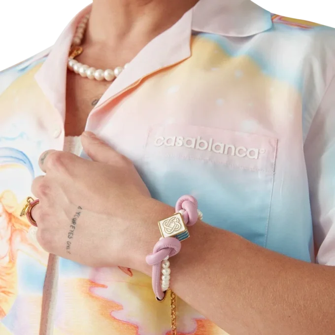 Pulsera de perlas con nudos rosa