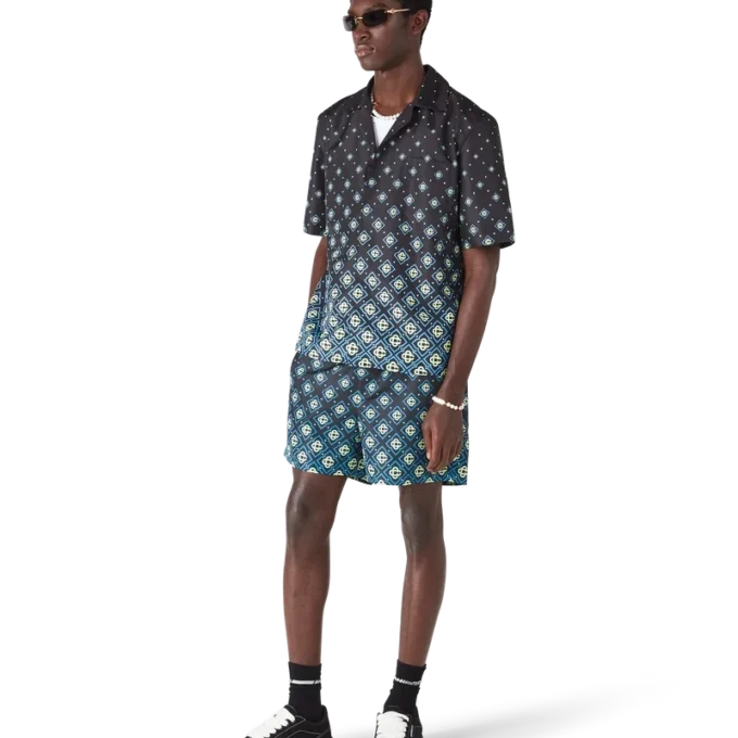 Ropa de baño de pantalones cortos con monograma negro degradado