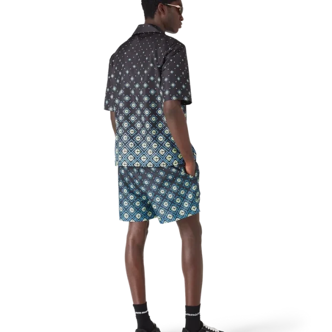 Ropa de baño de pantalones cortos con monograma negro degradado