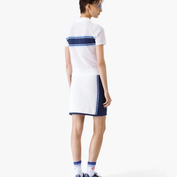 Top de malla a rayas blancas y azules