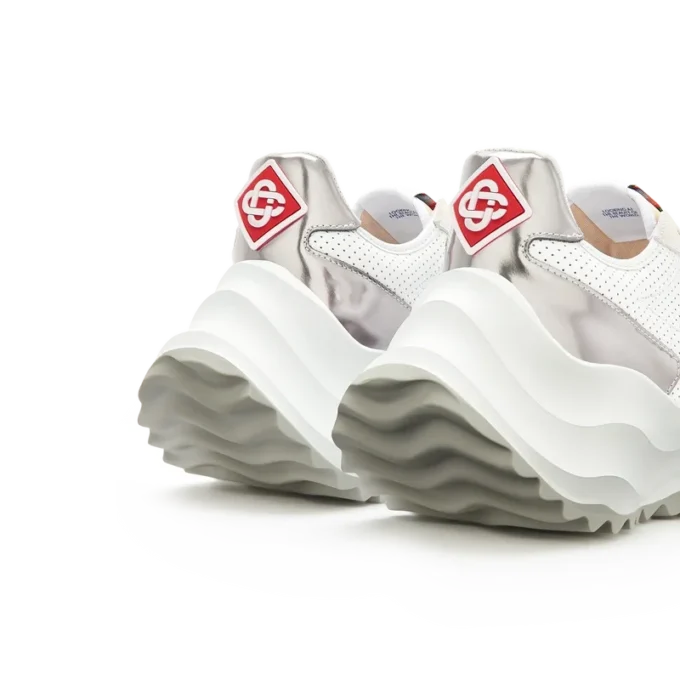 Zapatillas Atlantis blancas y cromadas para mujer